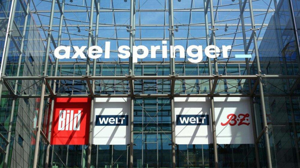 Axel Springer to cut jobs, warns AI could replace journalism