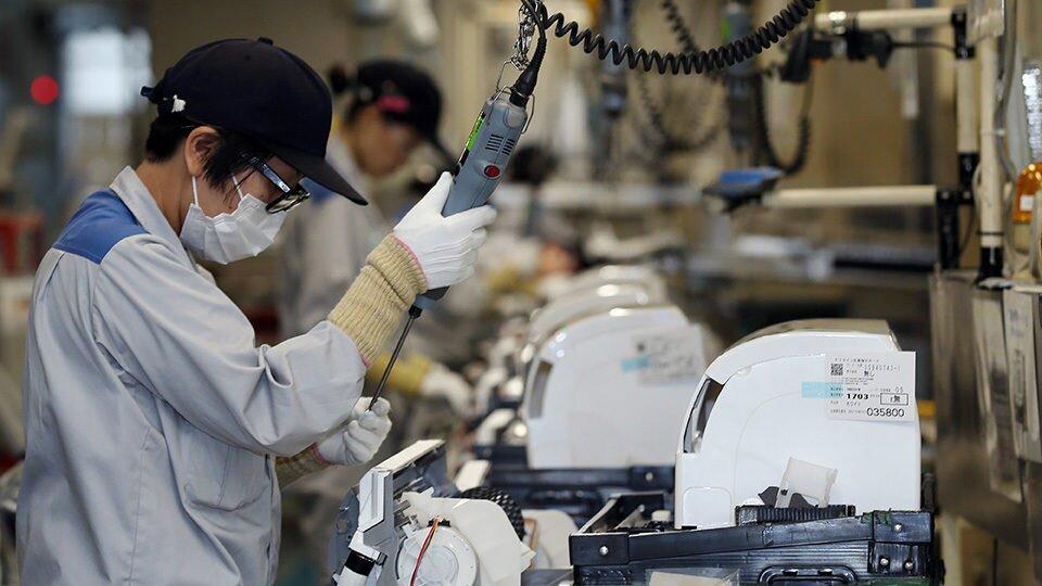 Japan's industrial output returns to growth in February